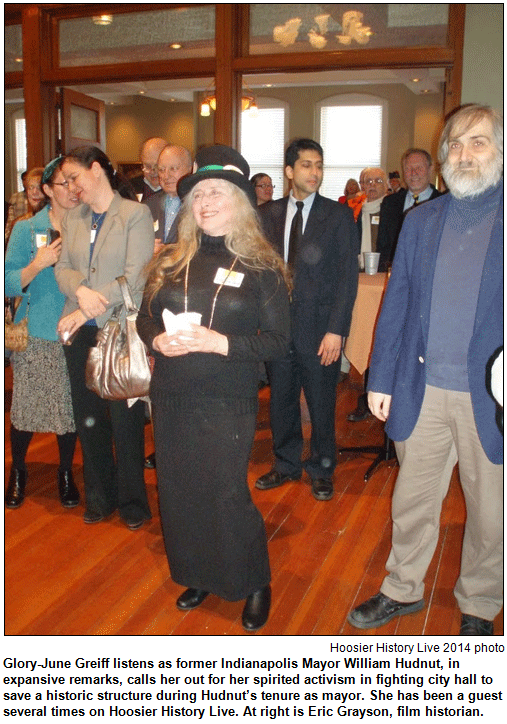 Glory-June Greiff listens as former Indianapolis Mayor William Hudnut, in expansive remarks, calls her out for her spirited activism in fighting city hall to save a historic structure during Hudnut’s tenure as mayor. She has been a guest several times on Hoosier History Live. At right is Eric Grayson, film historian. Hoosier History Live photo.