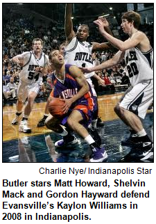 Butler stars Matt Howard, Shelvin Mack and Gordon Hayward defend Evansville’s Kaylon Williams in 2008 in Indianapolis. 