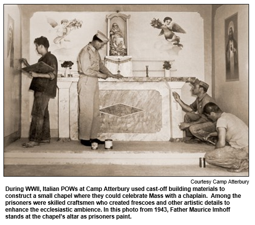 During WWII, Italian POWs at Camp Atterbury used cast-off building materials to construct a small chapel where they could celebrate Mass with a chaplain.  Among the prisoners were skilled craftsmen who created frescoes and other artistic details to enhance the ecclesiastic ambience.  In this photo from 1943, Father Maurice Imhoff stands at the chapel's altar as prisoners paint.  Photo courtesy Camp Atterbury.
