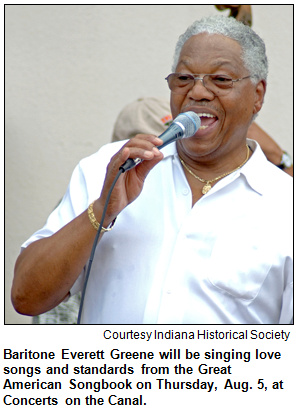 Everett Greene, singer, with microphone.