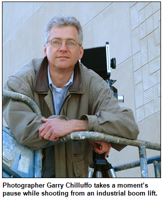 Photographer Garry Chilluffo on industrial lift. Photo courtesy Garry Chilluffo.