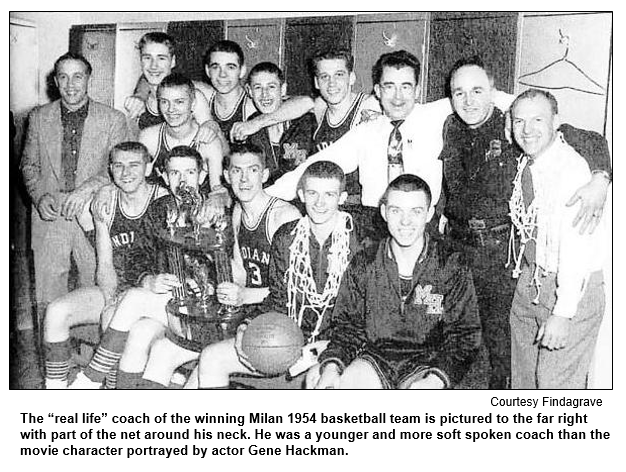 The real life coach of the winning Milan 1954 basketball team is pictured to the far right with part of the net around his neck. He was a younger and more soft spoken coach than the movie character portrayed by actor Gene Hackman. Photo courtesy findagrave.com.
