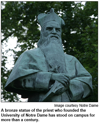 A bronze statue of the priest who founded the University of Notre Dame has stood on campus for more than a century.
 Image courtesy University of Notre Dame.