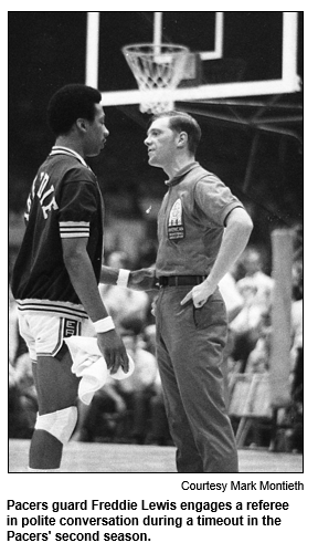 Pacers guard Freddie Lewis engages a referee in polite conversation during a timeout in the Pacers' second season.
Courtesy Mark Montieth.