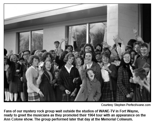 Fans of our mystery rock group wait outside the studios of WANE-TV in Fort Wayne, ready to greet the musicians as they promoted their 1964 tour with an appearance on the Ann Colone show. The group performed later that day at the Memorial Coliseum. Courtesy Courtesy Stephen Perfect/wane.com

