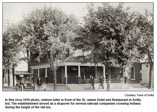 In this circa 1910 photo, visitors loiter in front of the St. James Hotel and Restaurant in Avilla, Ind. The establishment served as a stopover for several railroad companies crossing Indiana during the height of the rail era.  
Courtesy Town of Avilla.