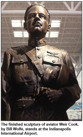 The finished sculpture of aviator Weir Cook, by Bill Wolfe, stands at the Indianapolis International Airport.
