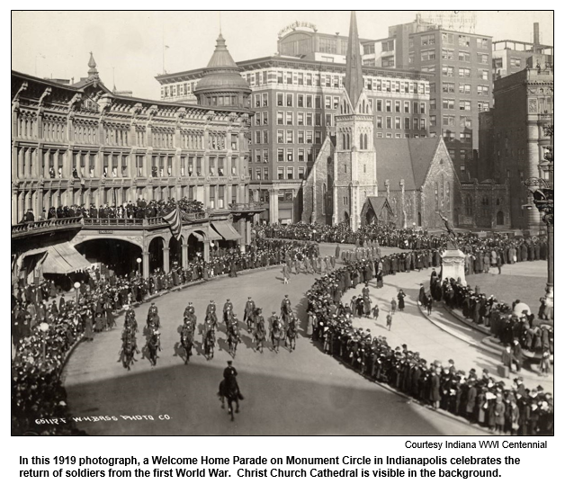 In this 1919 photograph, a Welcome Home Parade on Monument Circle in Indianapolis celebrates the return of soldiers from the first World War.  Christ Church Cathedral is visible in the background.  
Courtesy Indiana WWI Centennial.