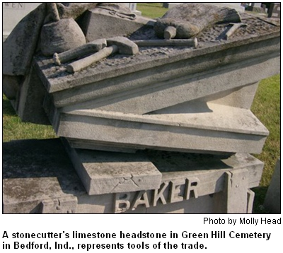 A stonecutter's limestone headstone in Green Hill Cemetery in Bedford, Ind., represents tools of the trade. Photo by Molly Head.